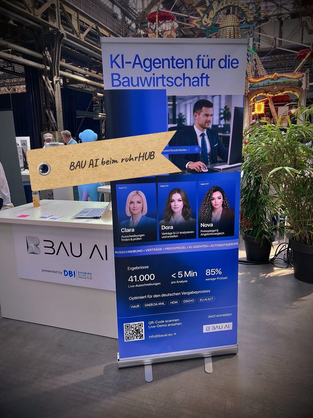 Der BAU AI Messestand mit Roll-up beim ruhrHUB auf dem r26 ruhrSUMMIT